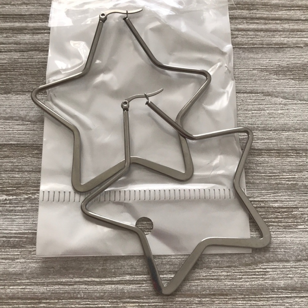 Silver stars earrings brand new